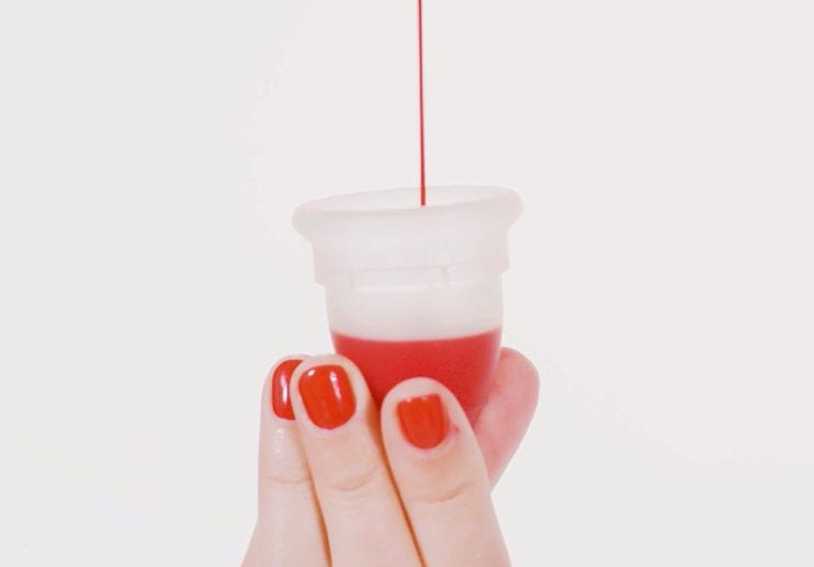 Mooncup close up with red liquid