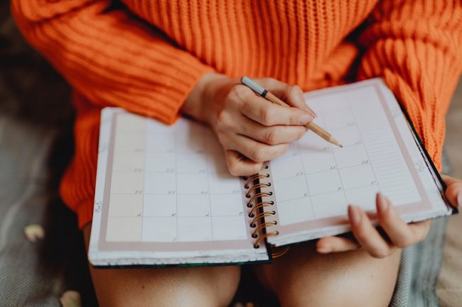 Woman checking her calendar