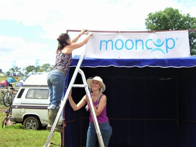 Setting up the Mooncup stall at Glastonbury