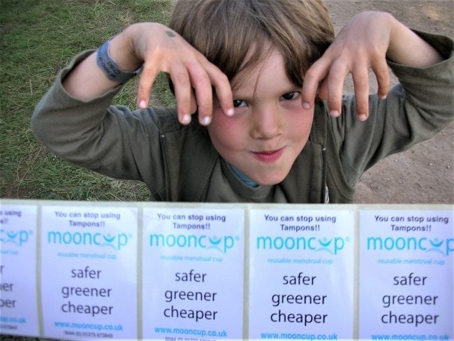 Young boy with Mooncup stickers