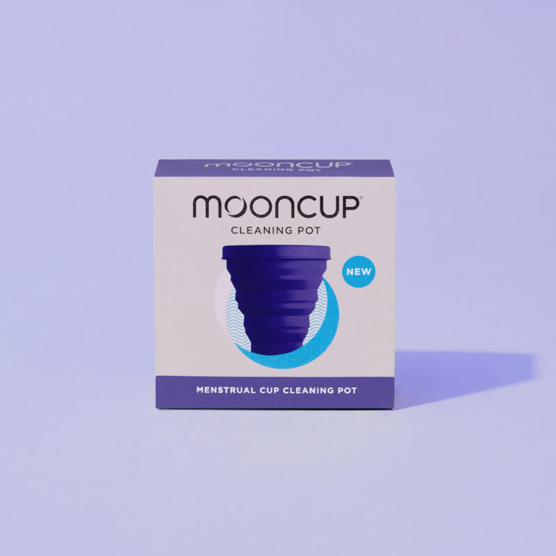 Mooncup Cleaning Pot in box on purple backdrop